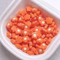 Close-up of orange acrylic flower beads with white centers for DIY jewelry making - 10mm (1.2mm Hole) / Orange