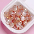 Pastel pink acrylic cat eye beads with rainbow UV coating for DIY jewelry making - 10mm / Brown