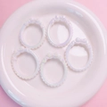 Detail of 5pcs iridescent resin bow beads for DIY jewelry and phone chain accessories - White