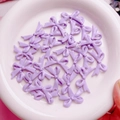 Lavendelpaarse strikbedeltjes met reliëftextuur voor DIY-sieraden maken en knutselen - 16.5x27mm (H3-Gestipte Strik) / Paars