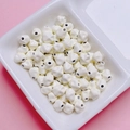 Primer plano de cuentas de estrella de 7mm en aleación crema para joyería DIY - 7mm / Blanco Roto