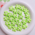 Lime green 20mm acrylic flower beads with white center for DIY jewelry making - Green