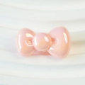 Parelmoer roze hars strik kraal voor DIY sieraden met zachte iriserende glans - 15x26mm / Fixeerpoeder