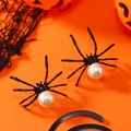 Detail view of gothic black spider earrings with large white pearls for Halloween - Black Body White Pearl
