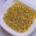 DIY jewelry making supplies featuring shiny gold acrylic seed beads in a white bowl - 200 Pieces/Pack (Approx. 4x6mm) / Bright Gold