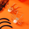 Detail of gothic spider earrings with gold finish, sparkling rhinestones and white pearls - KC Gold Body White Pearl