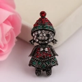 Macro shot of retro silver Christmas girl brooch with red and green rhinestones - BR1355 Antique Silver Girl