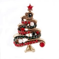 Close-up of vintage gold Christmas tree brooch with red and green rhinestones - Antique Gold Red Green