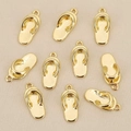 Detailed macro view of 18k gold-plated flip-flop pendants for DIY jewelry making - Single Flip-Flop Design / Gold Style 1