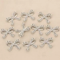 Pendentif nœud argenté avec perles et cristaux plaqué or 18k accessoire bijoux DIY - Argent