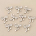 Detalle de colgantes de lazo plateado con circonitas para creación de joyas DIY - Estilo 3 Plateado