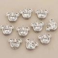 Close-up of 18k gold plated tiger pendants with large clear cubic zirconia stones - Silver 15*16.5