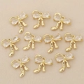 Set de 10 colgantes de lazo dorados con circonitas para creación de joyas DIY - Estilo 3 Dorado