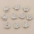 Detailed view of silver bear pendants featuring tiger-inspired crown engraving and clear zircon - Silver 10*11.5