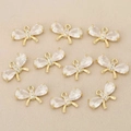 Detalle de colgantes de mariposa bañados en oro con circonitas para joyería DIY - Estilo 1 Dorado