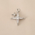 Macro shot of silver star pendant with cubic zirconia on beige silk fabric background - Star Flare Style (PJ0244) / Silver