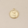 Detailed macro view of an 18K gold-plated circular charm with an embossed Chinese Fu character - With Pattern / Gold
