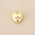 Detalle del colgante corazón de oro 18K con circonita estrellada y asa redonda para cadena - Estilo Corazón Estrella (PJ0176) / Dorado
