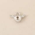Detailed close-up of heart-shaped wing pendant in silver finish with keyhole motif - Silver