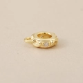 Macro detail of 18K gold plated bead spacer with embedded cubic zirconia and fine texture - Moon Style / Gold Moon Pattern