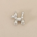 Macro view of a silver balloon dog pendant with high-polished mirror finish - Silver
