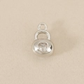 Detailed view of silver heart pendant with sparkling zircon on silk background - Heart Lock Style (PJ0714) / Silver