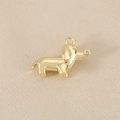 Detailed view of a gold dachshund pendant featuring a sparkling zircon nose accent - Gold