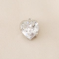Macro detail of heart-shaped zircon pendant with modern fluid silver-plated metal design - Silver Plated - Large