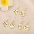 Detailed shot of three golden hook earrings with A, B, C letters and white cubic zirconia - Letter Y / Gold