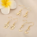 Macro detail of 18K gold plated copper initial earrings A B C with sparkling cubic zirconia - Letter V (PJ0227) / Gold