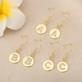 Detail of 18K gold plated letter earrings with A, B, and C charms featuring pavé zircons - Letter Y with Hook / Gold