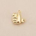 Macro shot of 18K gold plated thumb-up pendant with sparkling zircon inlays - Gold