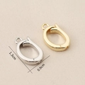 Macro shot of gold and silver plated oval spring clasps with 1.3cm dimension measurement - Oval Ring Spring Buckle Style (#4) / Silver