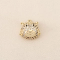 Macro detail of gold-plated tiger head charm with micro-pave sparkling cubic zirconia - Tiger Head (PJ0382) / Gold