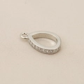 Macro view of teardrop pendant with 18K silver plating and micro-pave zircon crystals - Silver