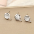 Macro shot of S925 sterling silver ear studs with opal stone and DIY hanging loops - Silver