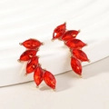 Golden alloy wing earrings with red marquise crystals in a minimalist curved design - Red