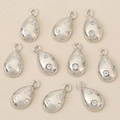 Macro view of ten water-drop zircon pendants with 18k gold plating on beige background - Silver Water Drop Style (Style 5)