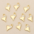 Close-up of gold heart pendants with inset zircon stones for DIY jewelry making - Gold Heart with Single Stone (Style 4)