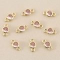 Macro view of 18k gold plated round pink zircon connectors for DIY jewelry making - Gold Pink