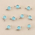 Close-up of 10 sky blue zircon round connector charms for DIY jewelry making - Silver Turquoise