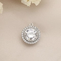 Macro detail of a round crystal pendant with a silver-tone base on champagne satin fabric - Double Halo Round Style (PJ0015-Silver)