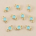 Close-up of light blue zircon connectors in 18k gold plating for DIY jewelry - 3mm / Gold Turquoise