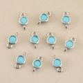 Detailed view of silver finish 18k gold-plated sky blue birthstone charm connectors - Silver Sky Blue