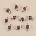 Macro detail of 18k gold plated birthstone connector with vibrant red crystal stones - Silver Color Red