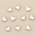 Detailed view of ten heart-shaped silver metal pendants for DIY jewelry making - Silver Mirror Plain Heart (Style 6)