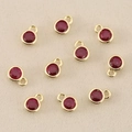 Detailed view of 18k gold plated round ruby red cubic zirconia pendants for DIY jewelry - 3mm / Golden Red
