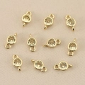 Macro shot of 18k gold plated double-loop round charms with clear yellow crystals - Golden Yellow