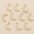 Close-up of ten gold-plated crescent moon charms with cubic zirconia for jewelry DIY - Gold Crescent Moon Shape (Style 8)