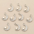 Detailed view of ten sparkling silver moon and star charms for DIY jewelry making - Silver Star & Moon Combination (Style 10)
